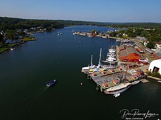 https://overlandtraveltips.com/wp-content/uploads/2026/08/330px-Mystic_Shipyard_aerial_by_Don_Ramey_Logan.jpg