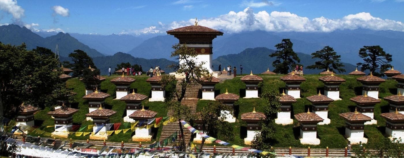 https://overlandtraveltips.com/wp-content/uploads/2026/08/Monument-with-108-chorten-Dochula-Pass-Bhutan-min.jpg