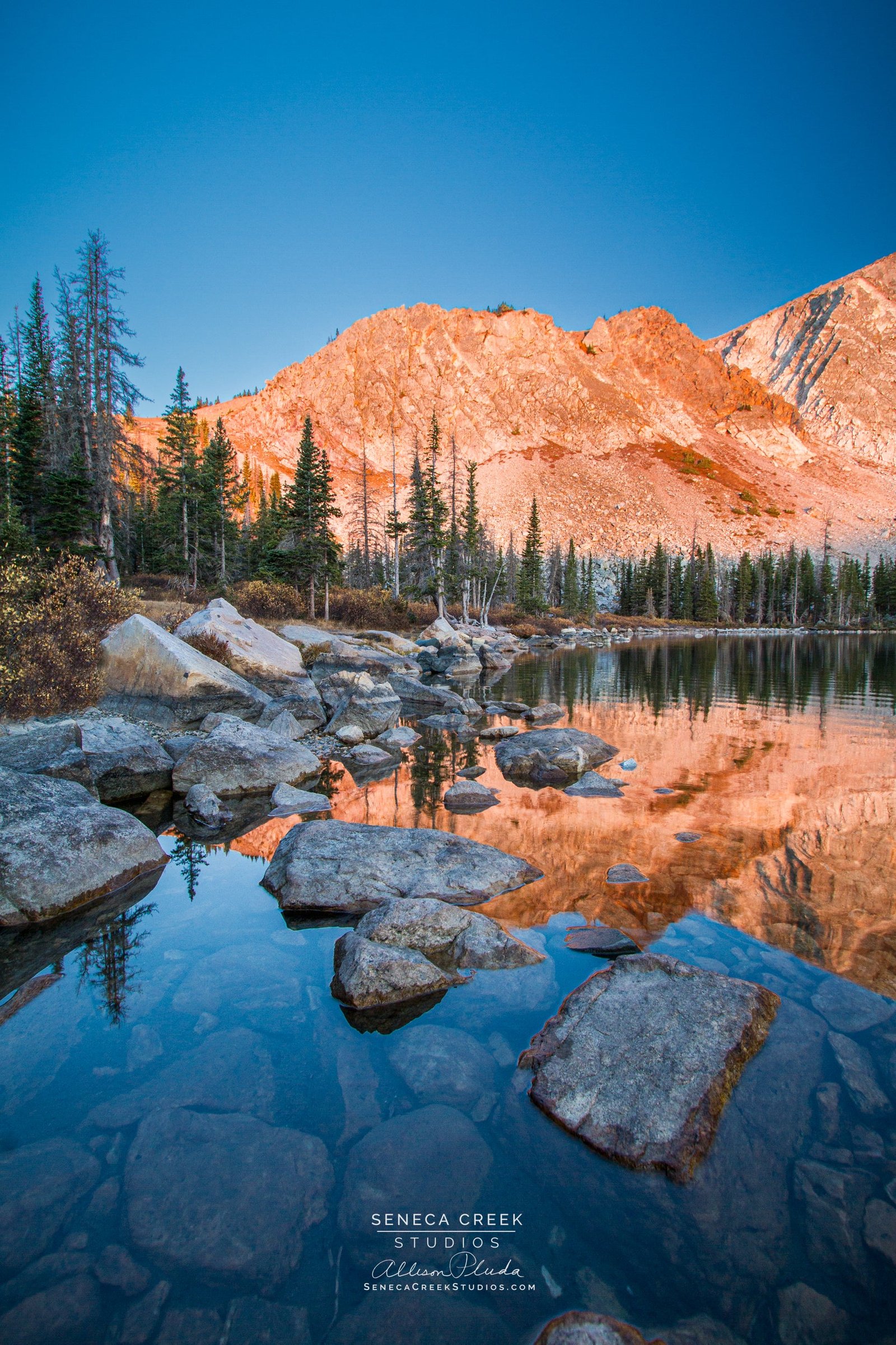 https://overlandtraveltips.com/wp-content/uploads/2026/08/RockyMountainSunriseAlpenglowLakeReflections-2012-9-29SunriseCamponLakeMarie_56_-Copyright-Allison-Pluda_2000x.jpg
