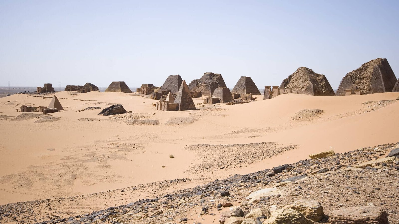 https://overlandtraveltips.com/wp-content/uploads/2026/08/pyramids-in-the-desert-sudan.jpg