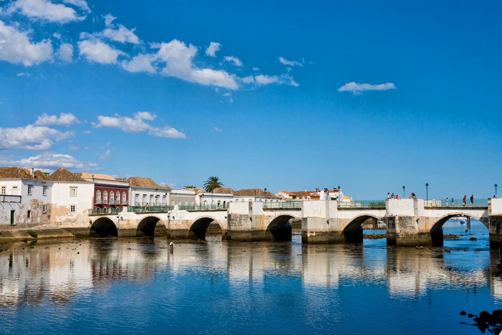https://overlandtraveltips.com/wp-content/uploads/2026/08/tavira-roman-bridge.jpg
