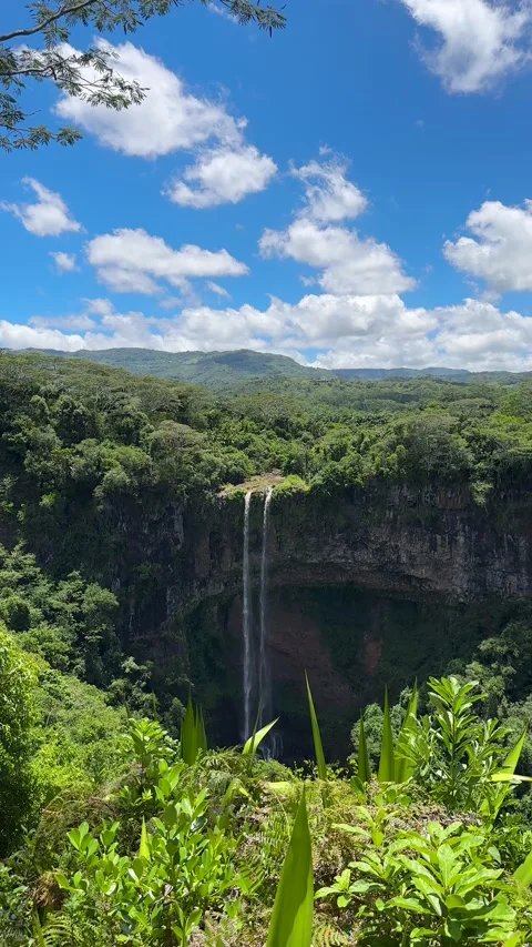 https://overlandtraveltips.com/wp-content/uploads/2026/08/vertical-footage-majestic-chamarel-waterfall-footage-308191073_iconl.jpeg